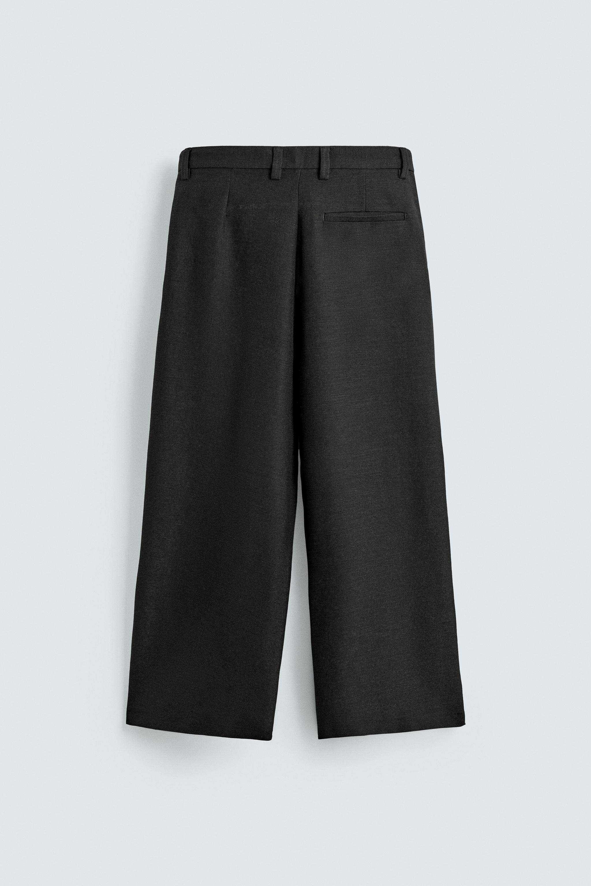 PLEATED RELAXED FIT PANTS